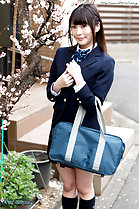 Nonomiya Misato standing in street holding bag