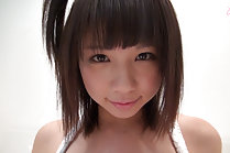 Cutie Minami S has her breasts fondled on bed in panties