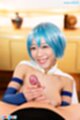 Smiling broadly giving handjob