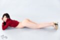 Lying on her front pert ass high heels