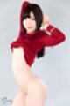 Shino aoi raising her arms wearing red top