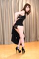 Pulling black dress up exposing panties wearing high heels
