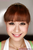 Smiling with hair tied back
