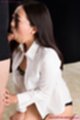 Sucking cock on her knees wearing white shirt