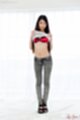 Kamimoto rio raising her top over her crimson bra in jeans wearing high heels