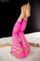 Kazuki yuu on her back legs raised wearing pink pantyhose bare feet raised.jpeg