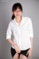 Office lady wearing white shirt raising black skirt