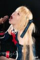 Mary on her knees head thrown back mouth open stroking cock