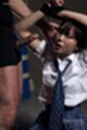 Mizushima ai kneeling wearing uniform looking at cock wrists bound