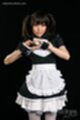 Maid in uniform hair in pigtails
