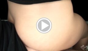 Madoka Yukishiro standing naked stroking cock and giving assjob